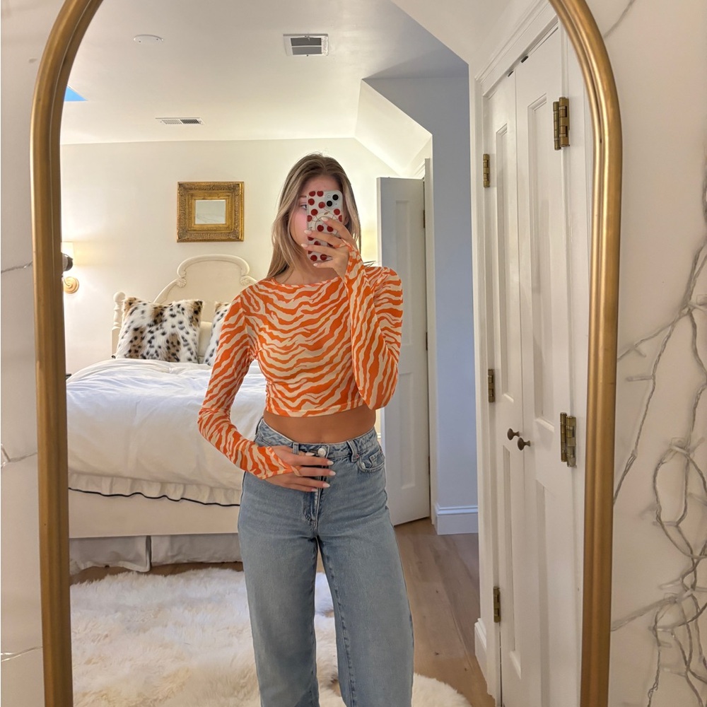 Mesh tiger top